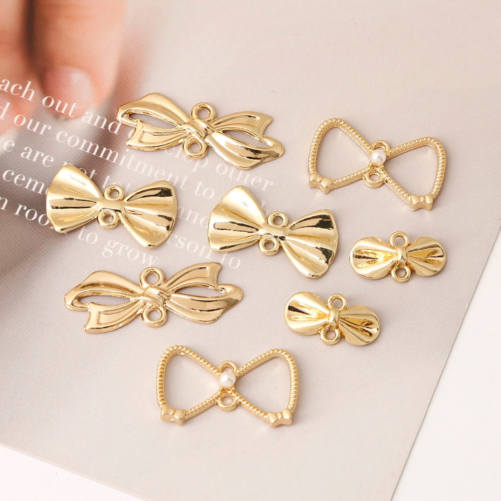 Vintage Fashion Nz - Colgante de lazo de oro antiguo