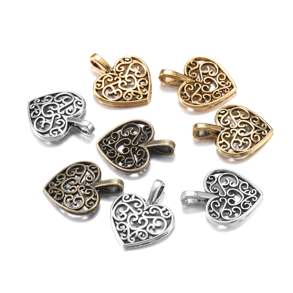 Dijes de corazón de amor hueco - Vintage Fashion Nz reseña y precio
