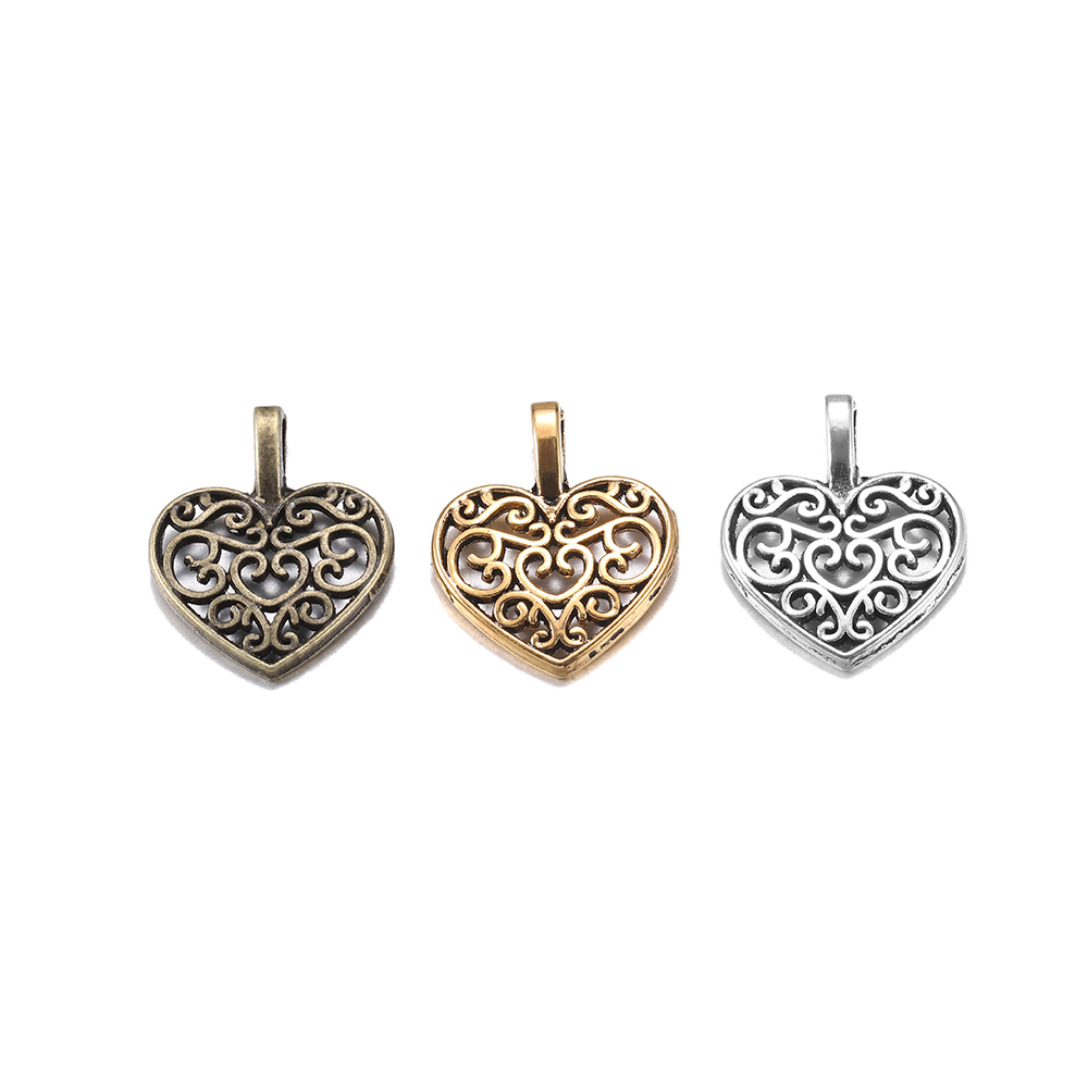 Dijes de corazón de amor hueco - Vintage Fashion Nz reseña y precio